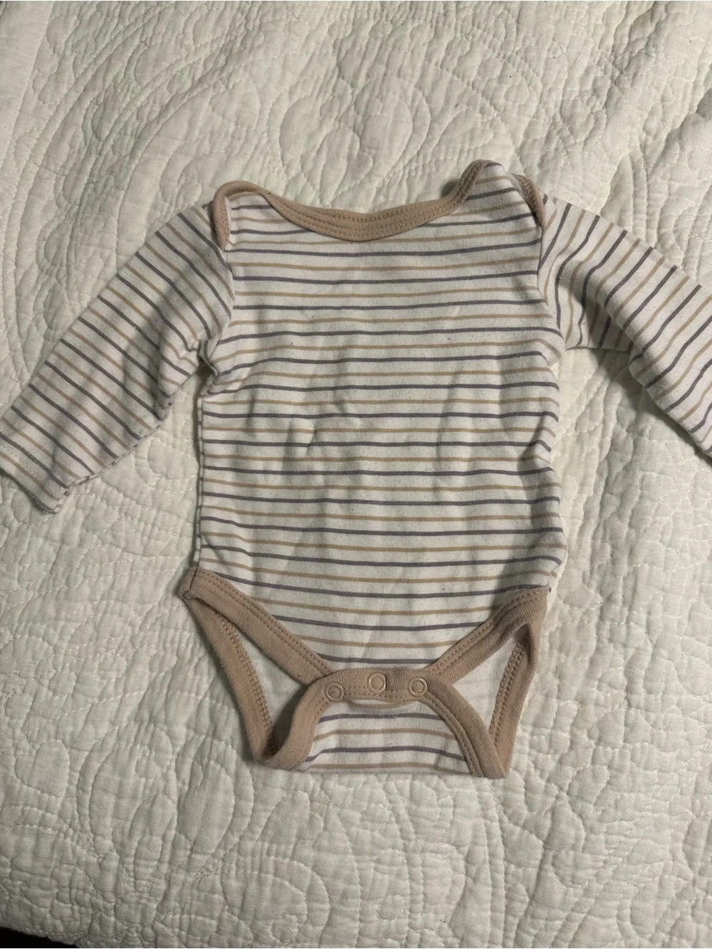 0287 4 piece set of footed PJs and onesies size 0-3 and newborn